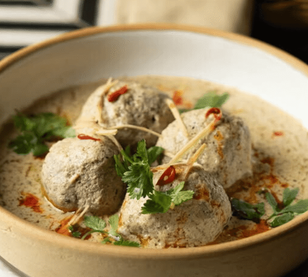 Kashmiri Gushtaba hand pounded mutton balls cooked in creamy yogurt based gravy
