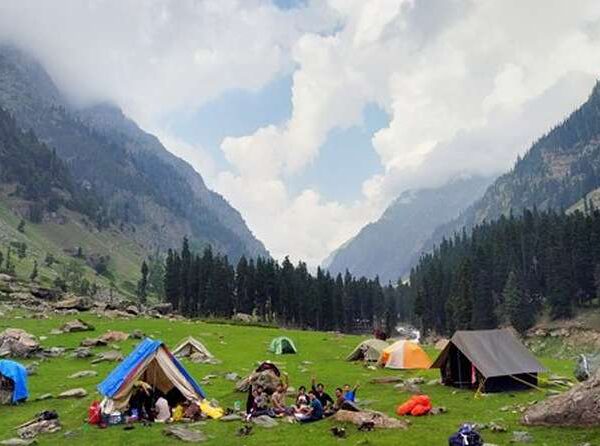 Trekking and camping in Kashmir in November with mountain backdrop crisp autumn weather and Himalayan trails
