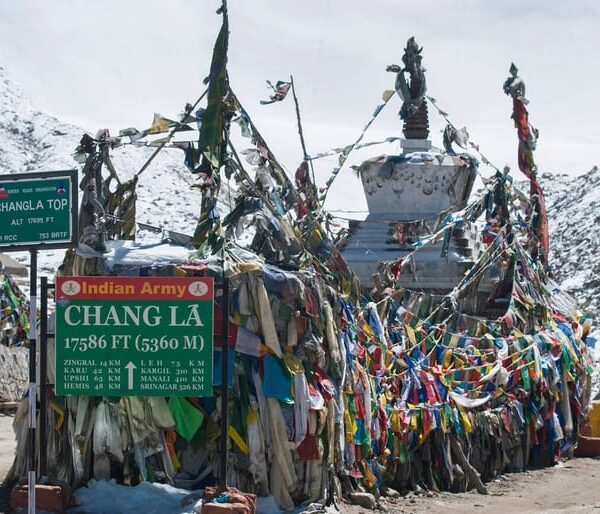 Vehicles driving through Chang La on a high-altitude Himalayan road
